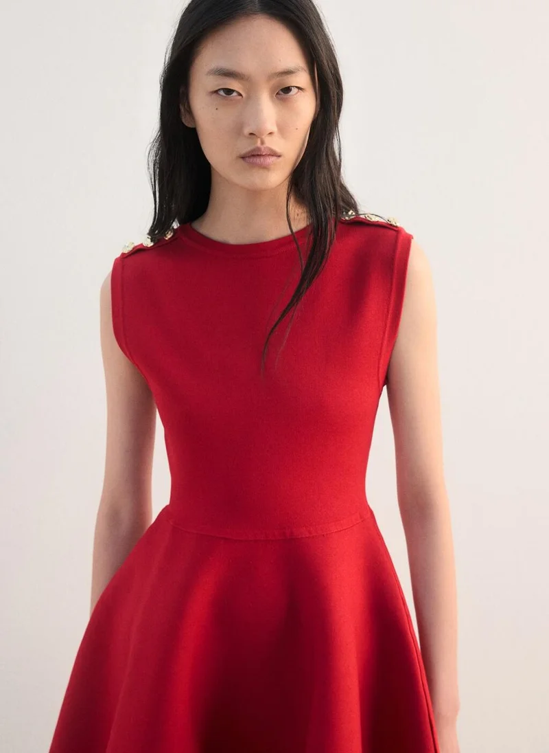 Mango  Peplum knit dress with buttons for Women | Best Price UAE